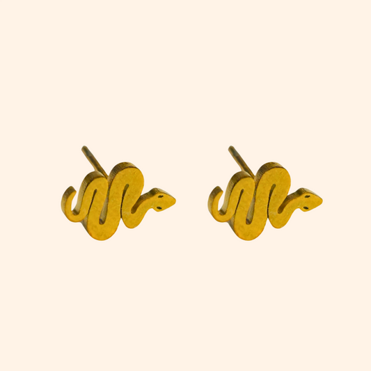 The Snake Small Earrings by Roots Jewellery, with their elegant gold snake-shaped design, rest on a light background, showcasing a stylish accessory perfect for any occasion.